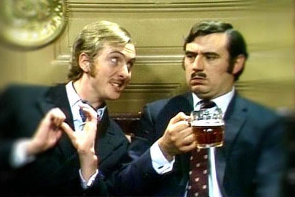 Eric and Terry Jones in the famous Monty Python sketch Candid Photography, better known as Nudge Nudge.